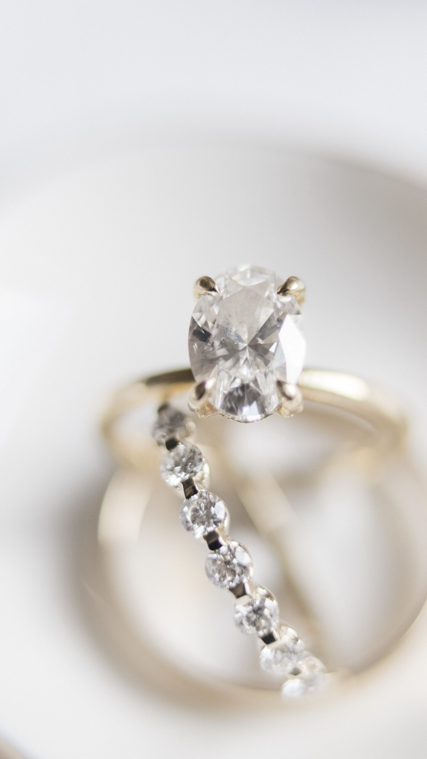 closeup of diamond wedding and engagement rings