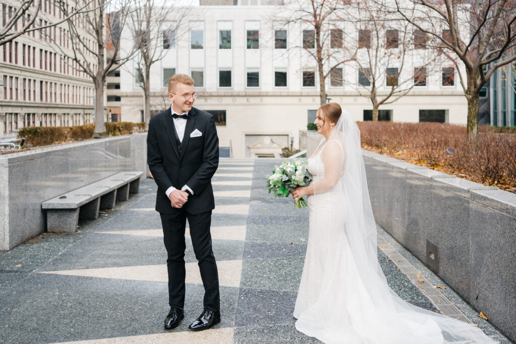 Emotional first look as the groom sees the bride for the first time at Embassy Suites Pittsburgh Downtown.