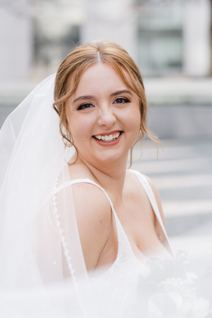 Bride posing elegantly in her wedding dress at Embassy Suites Pittsburgh Downtown