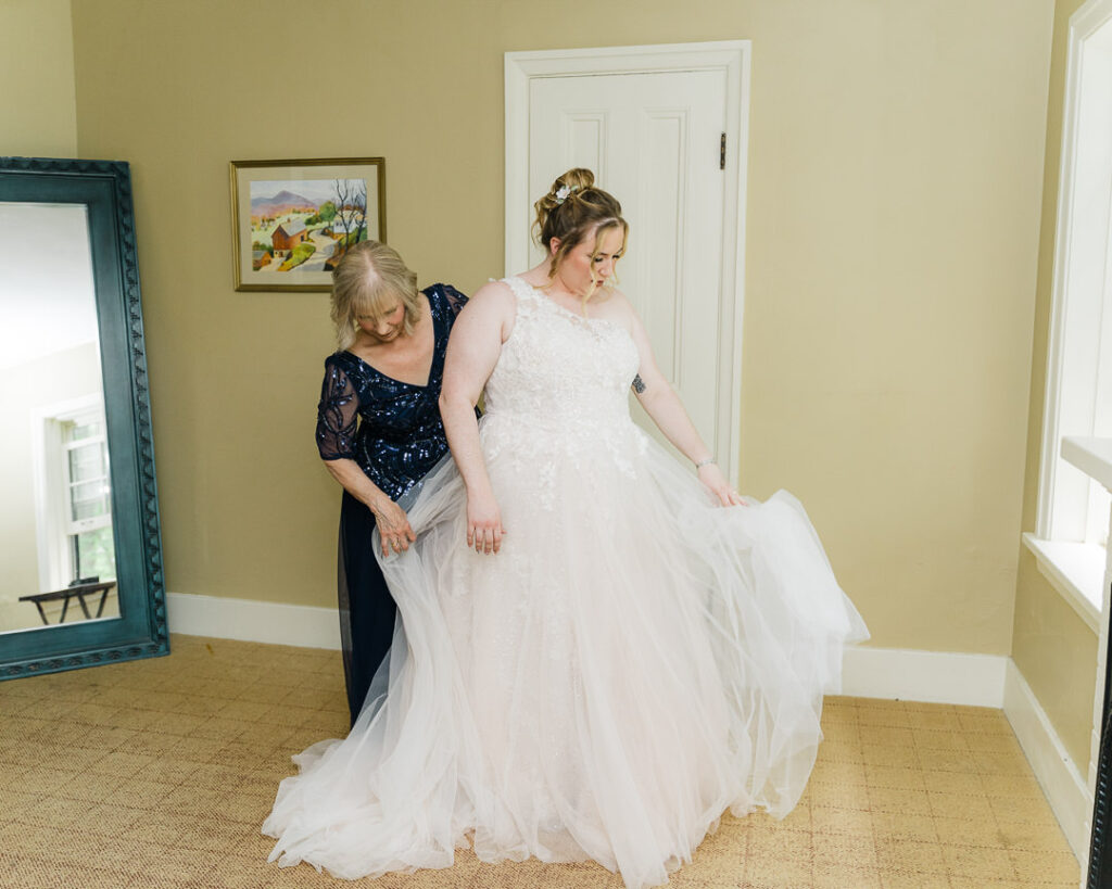 Bride getting ready with mom at Succop Nature Park 