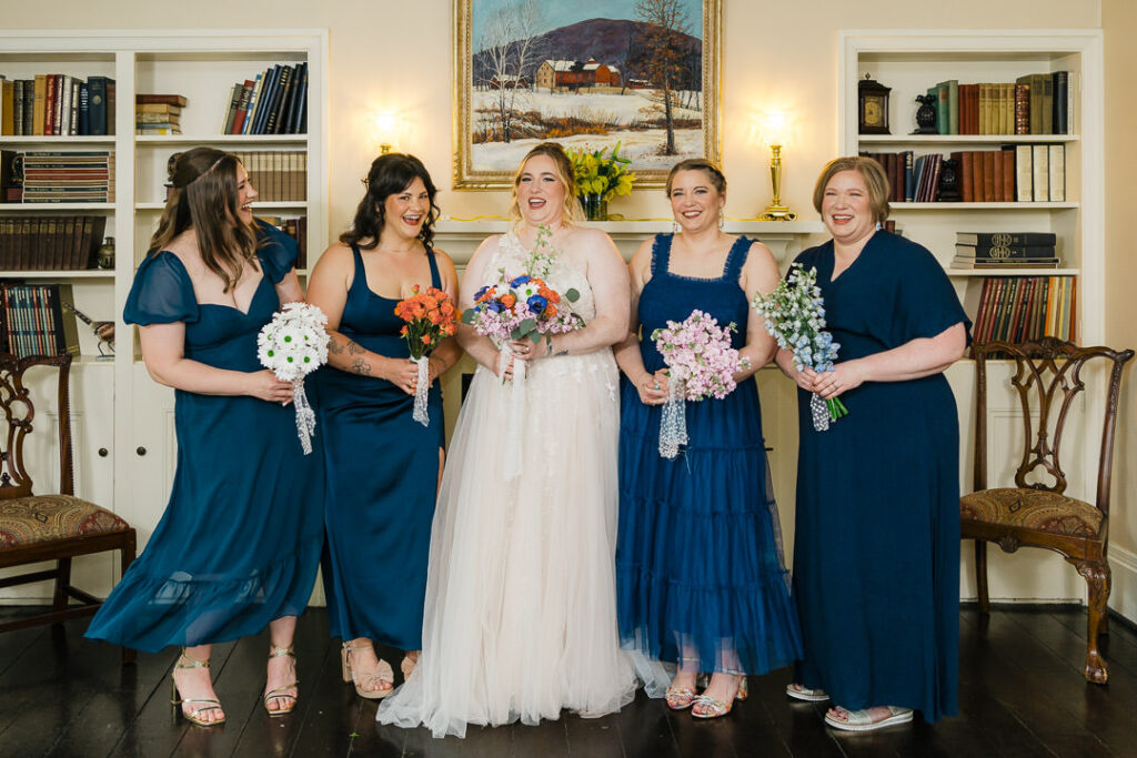 Bridal party candid laughter Butler County venue
