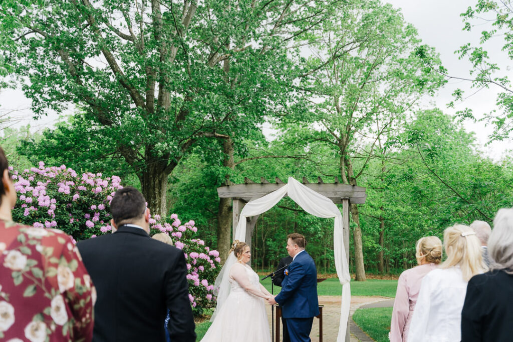 Couple exchanging vows Succop Nature Park ceremony