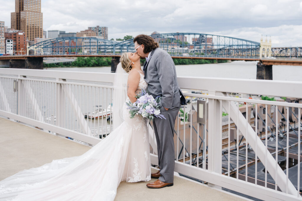 Romantic balcony portraits with city views at Sheraton Station Square wedding
